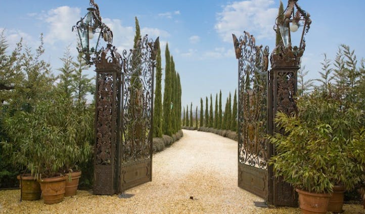 The intricate iron gateway to Borgo Santo Pietro
