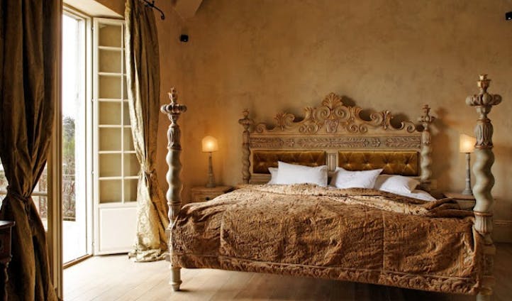 Classic Italian style adorns each room at Borgo Santo Pietro
