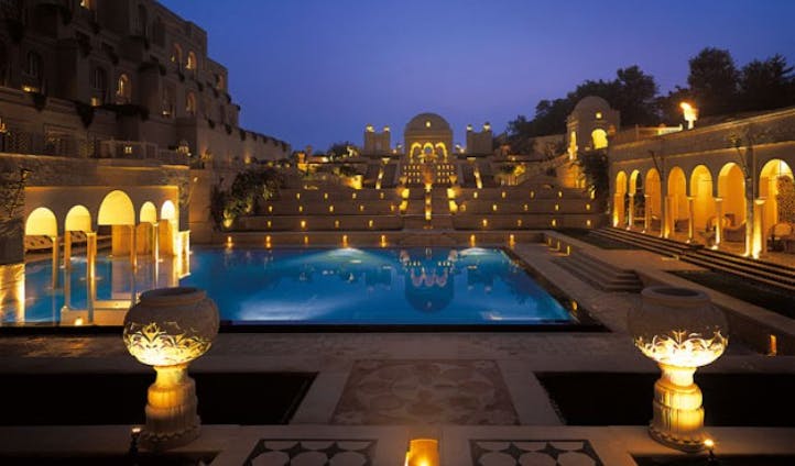 Stunning pool areas lit up at night at Amarvilla, Agra, India