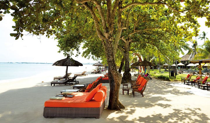 Luxury hotel beach at Jimbaran Puri, Bali, Indonesia