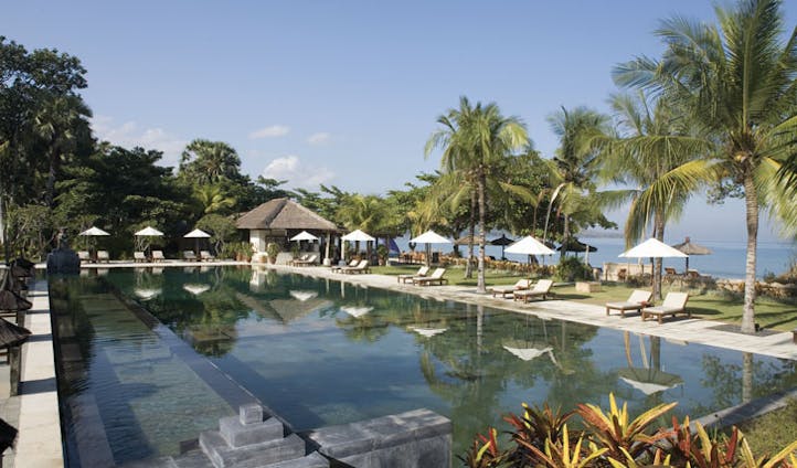 Luxury hotel pool at Jimbaran Puri, Bali, Indonesia