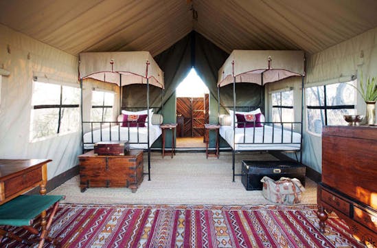 The twin tent has beautiful furniture
