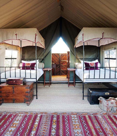 The twin tent has beautiful furniture