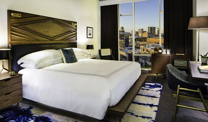 A luxury bedroom overlooking the city of Nashville