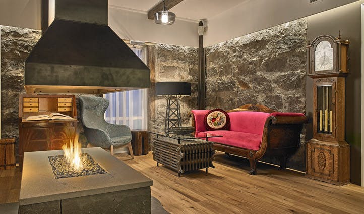 An open fireplace burns at your Reykjavik hotel