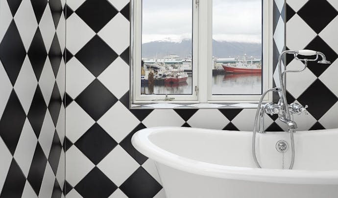 A bathroom overlooking the harbour in Reykjavik