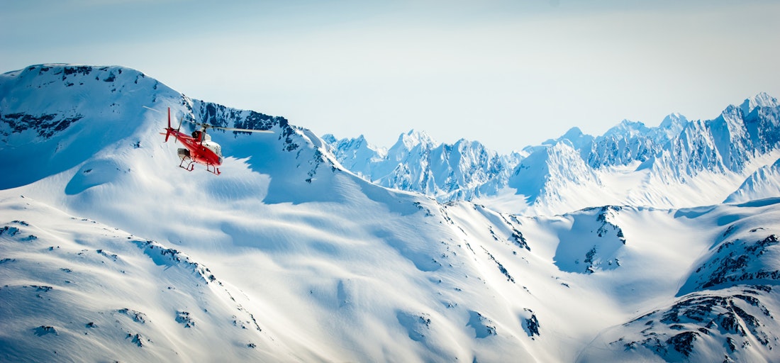 Embark on a private heli-hiking tour of Alaska's snowy mountains
