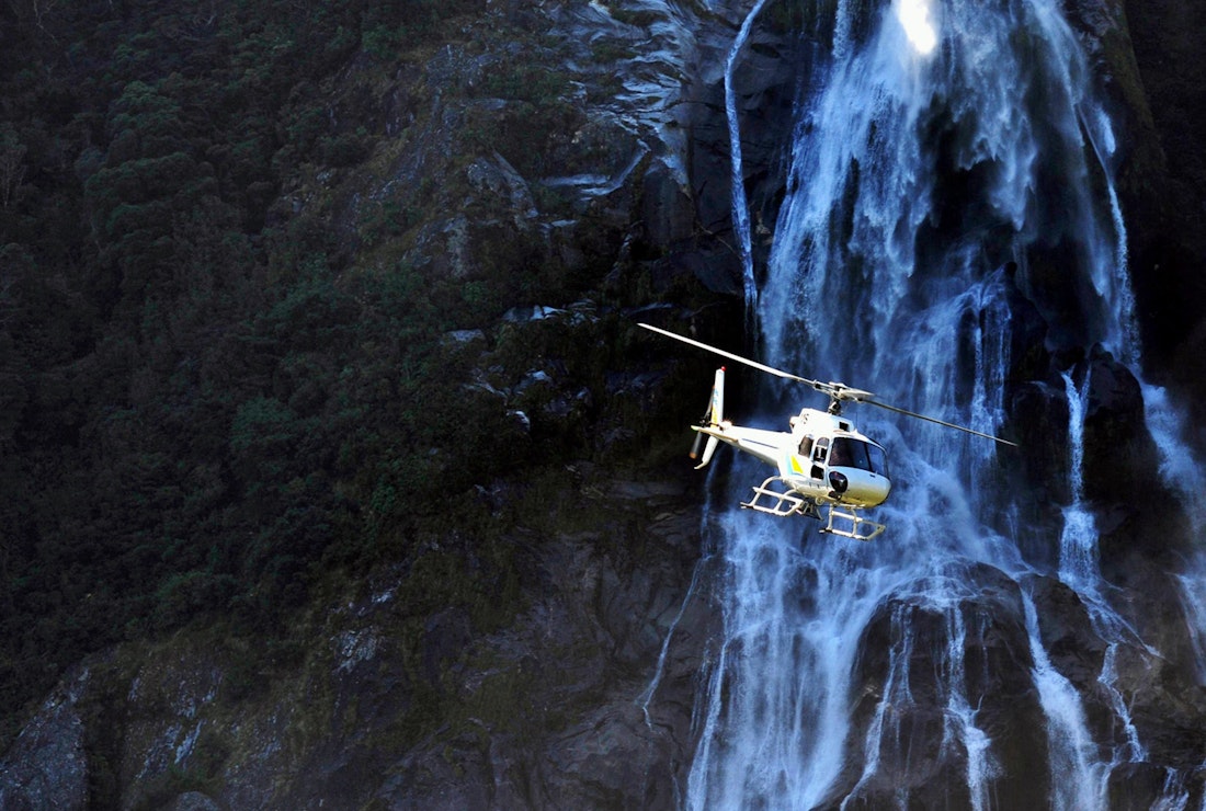 helicopter ride to milford sound in new zealand south island