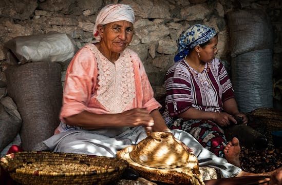 Moroccan women weaving baskets
