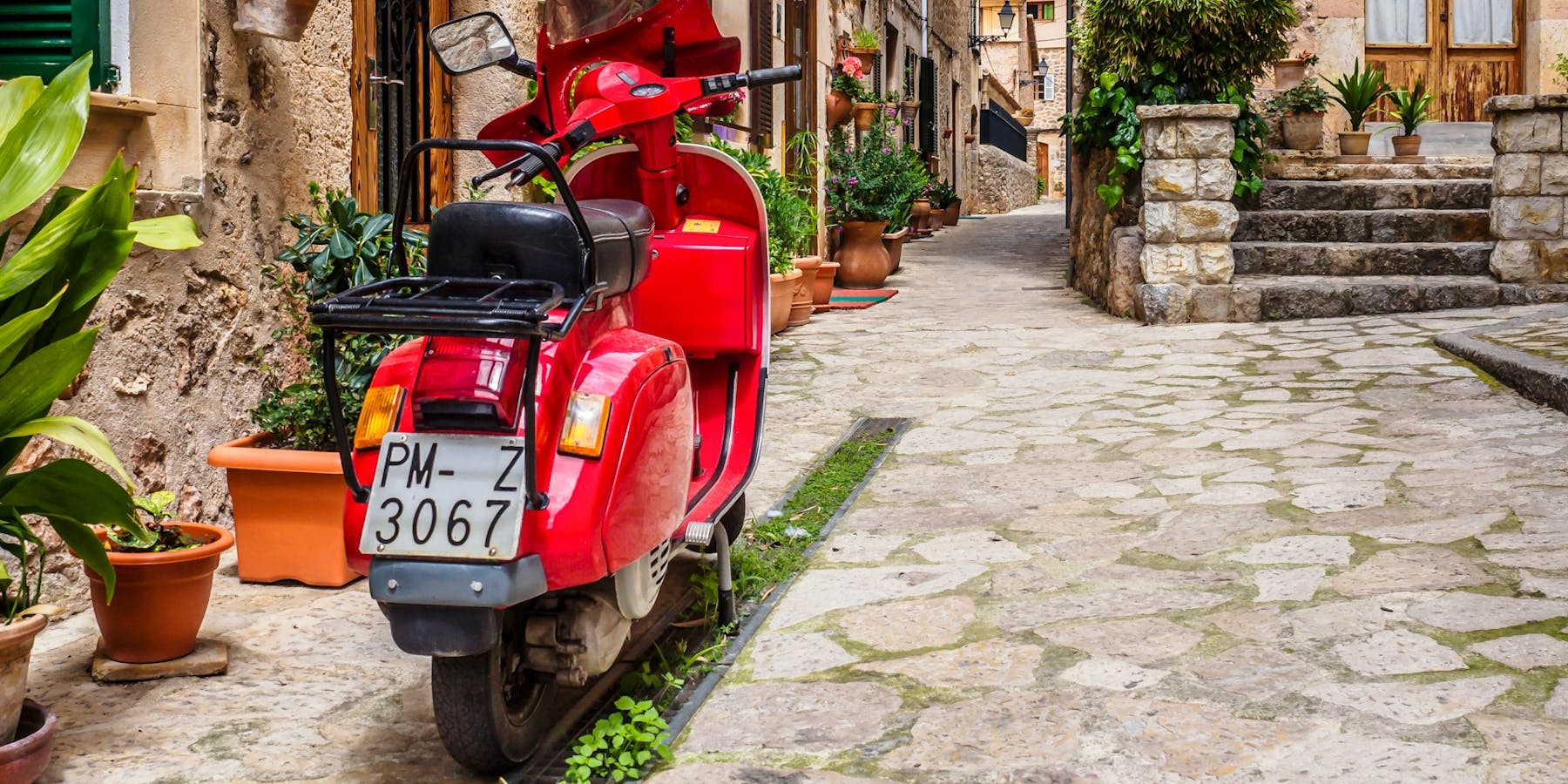 Scooter in the backstreets of Valledemossa, Mallorca, Spain