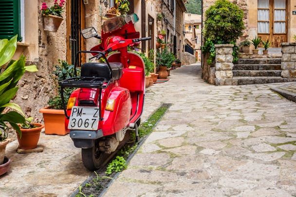 Scooter in the backstreets of Valledemossa, Mallorca, Spain