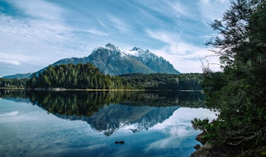 Snowy peaks, lush forests and waterways in Patagonia, Argentina - one of our top picks on where to go in 2024