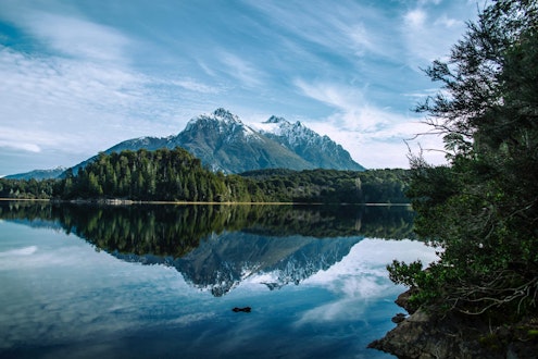 Snowy peaks, lush forests and waterways in Patagonia, Argentina - one of our top picks on where to go in 2024