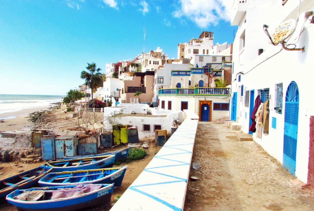 Seaside buildings and boats in Tangier, Morocco - one of our favourite places to travel in 2024