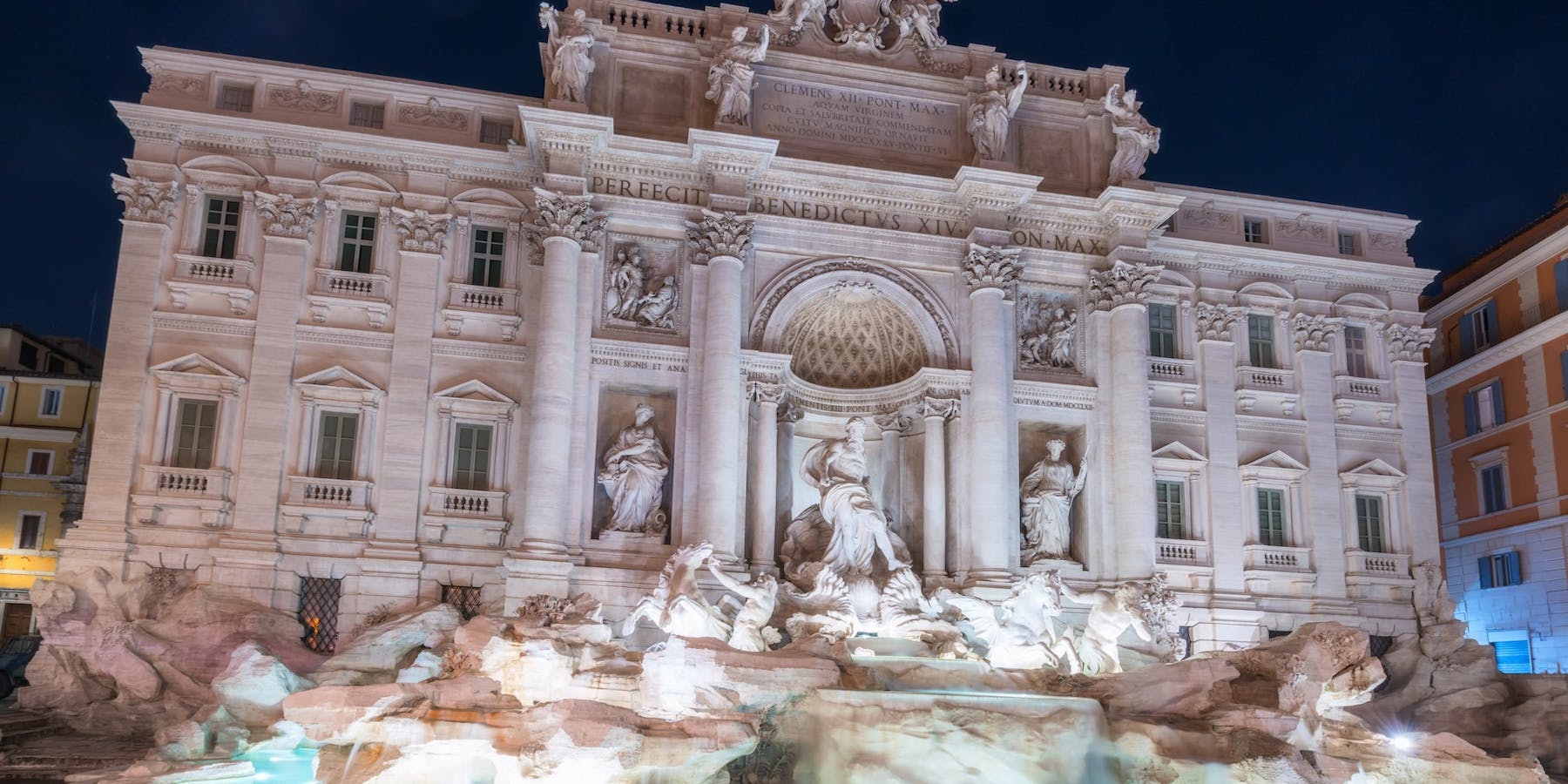 Trevi fountain at dusk in Rome, Italy
