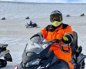 Elena on a skidoo in Iceland