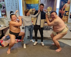 Rob O'Leary in Japan with sumo wrestlers
