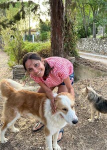 Janine Shroff meeting the dogs of Sicily